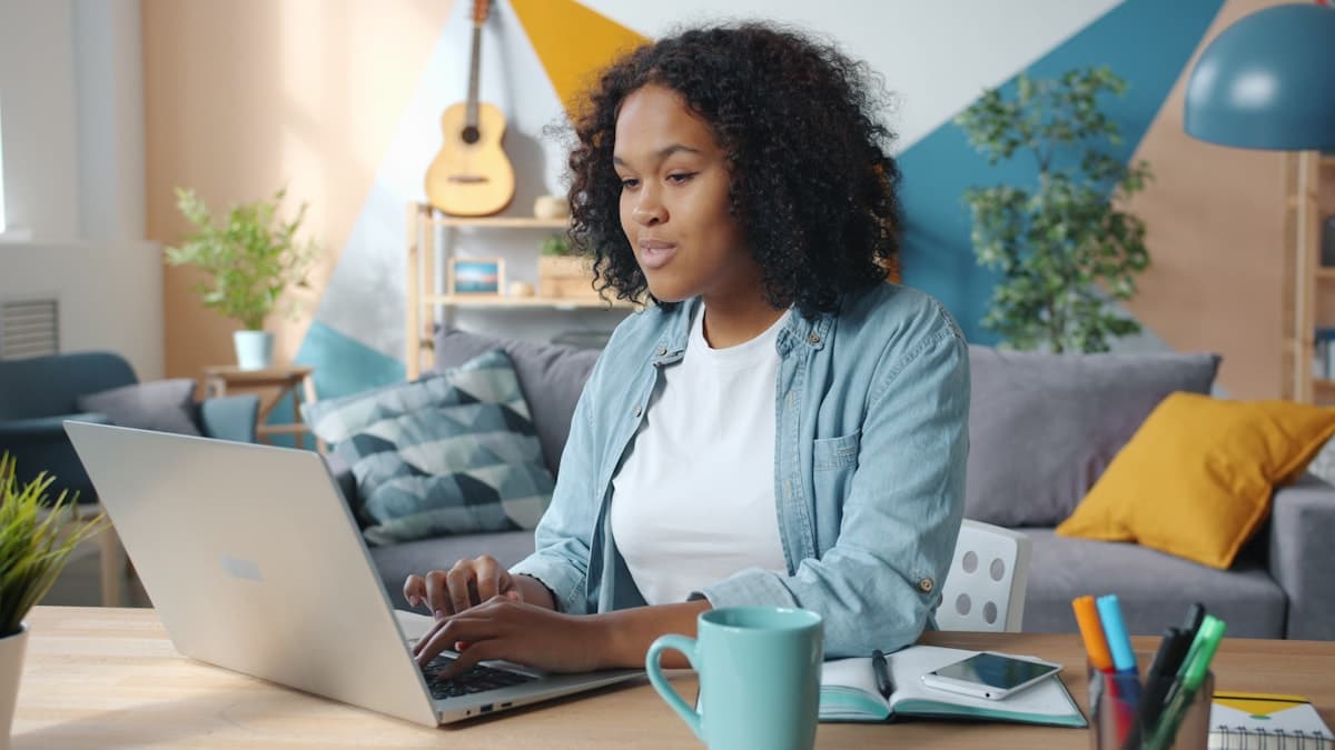 A professional working at her laptop